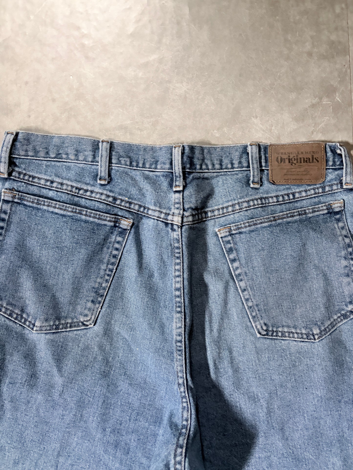 2000's Originals Light Wash Jorts Back Pocket Detail
