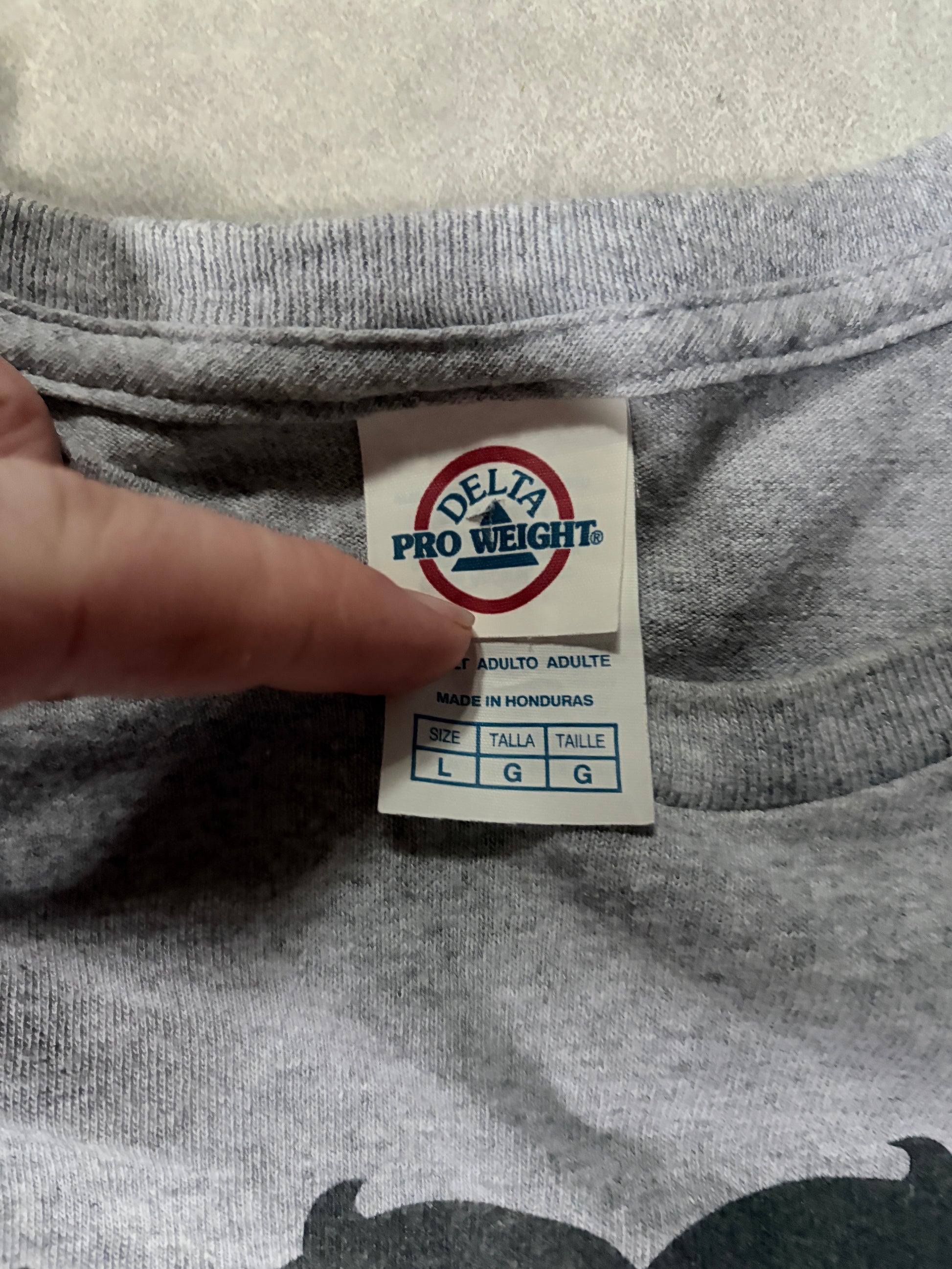 90's Vintage Delta Tag Close Up with Brand Label