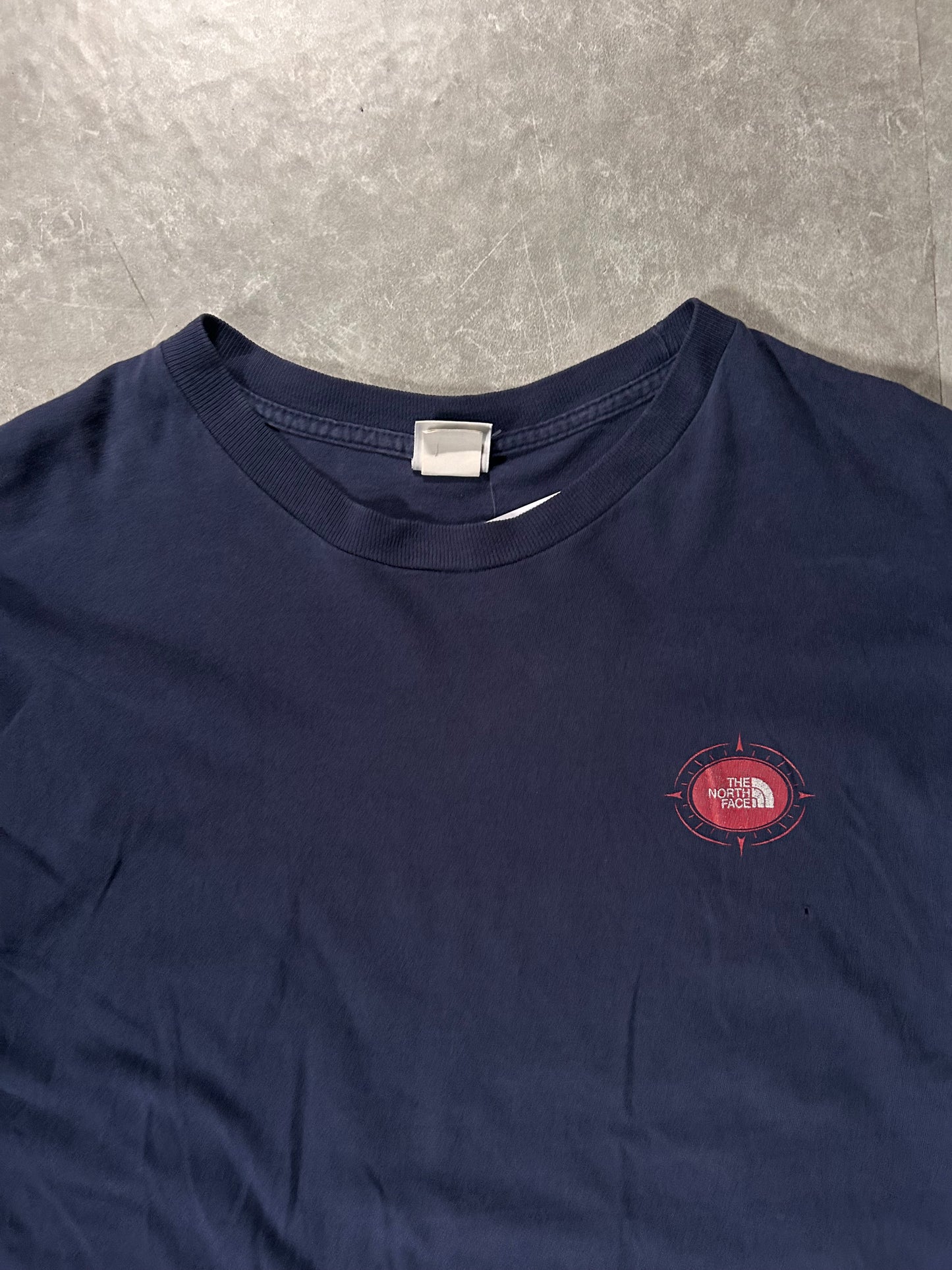 90's Vintage North Face Compass Graphic Navy T-Shirt Close Up