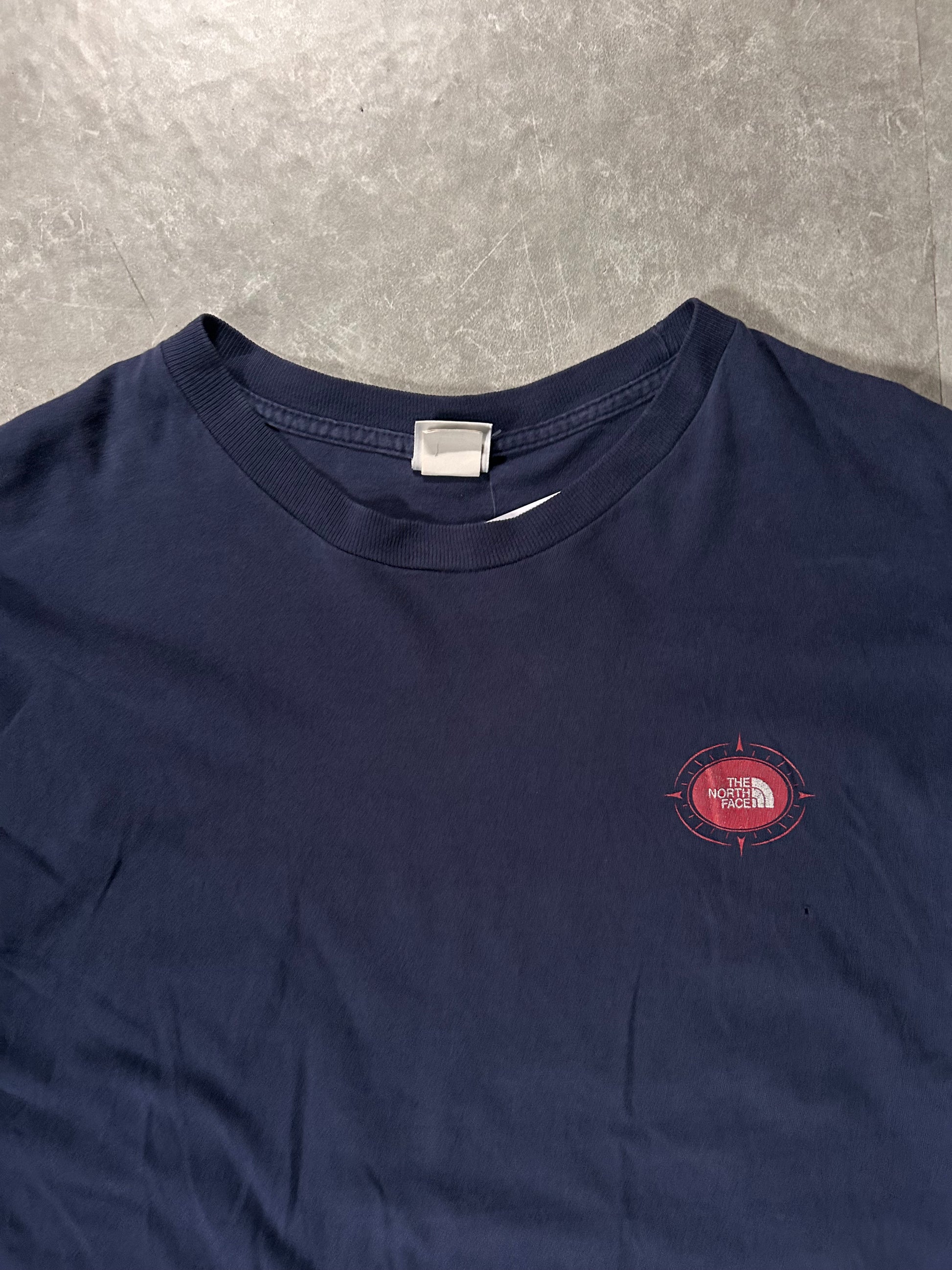 90's Vintage North Face Compass Graphic Navy T-Shirt Close Up
